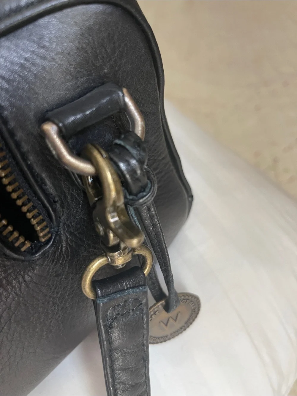 Black Leather Satchel with Top Handles and Crossbody Strap